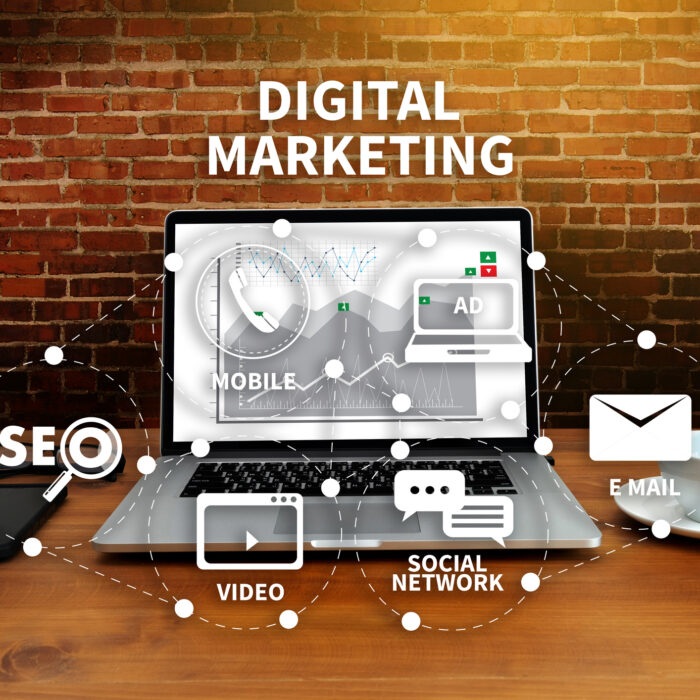 DIGITAL MARKETING new startup project MILLENNIALS Business team hands at work with financial reports and a laptop